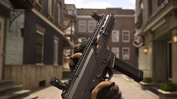 Screenshot of Warzone player holding ISO 45 SMG in abandoned street