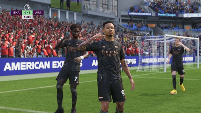 Screenshot of EA Sports FC Arsenal players holding hands to their faces with crowd in the background