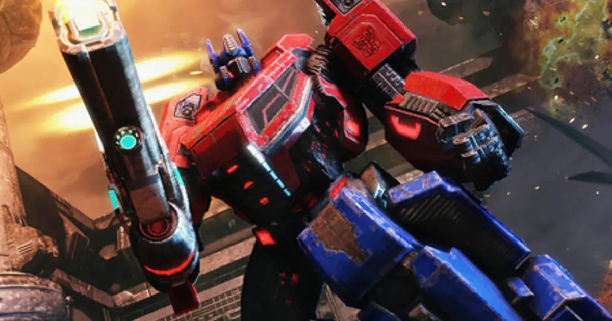 Optimus Prime shoots a gun in Transformers: Fall of Cybertron