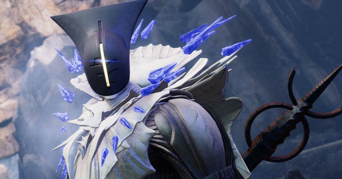 A close-up of a Dread enemy in Destiny 2 The Final Shape, with Stasis ice crystals hovering around its alien head as it looks towards the camera.