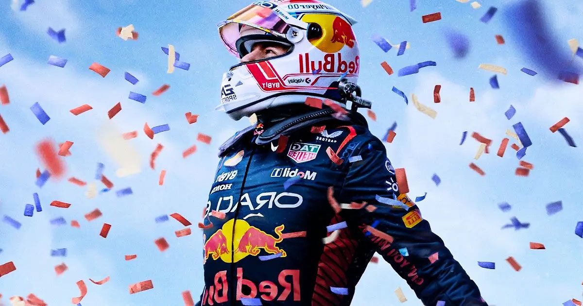 Max Verstappen wearing a white Red Bull helmet is celebrating as confetti falls from the sky.