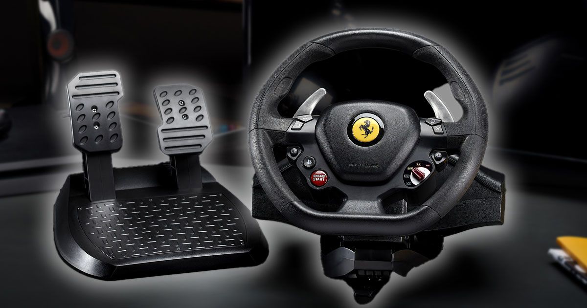 A black Thrustmaster racing wheel featuring the Ferrari badge in the center. There's a two pedal set next to the wheel.