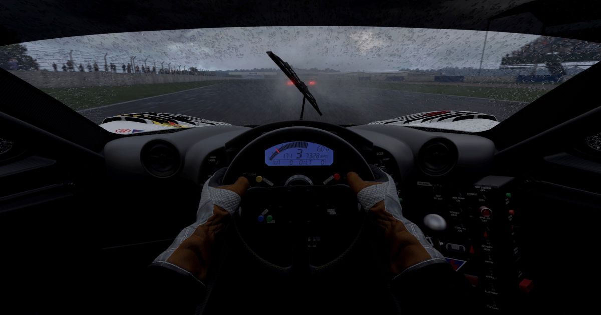 First-person shot from Automobilista 2 of someone in white and orange gloves racing from a car cockpit on a rainy track.