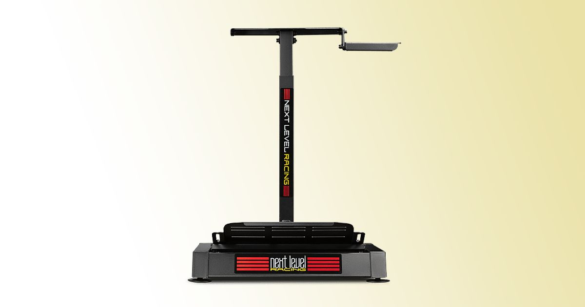 A black wheel stand featuring red, yellow, and white Next Level Racing branding on the front, with the stand in front of a white and yellow gradient background.