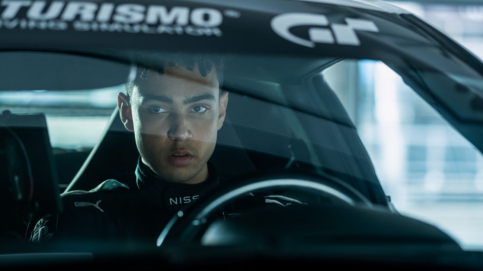 Archie Madehawke as Jann Mardenborough in Gran Turismo movie