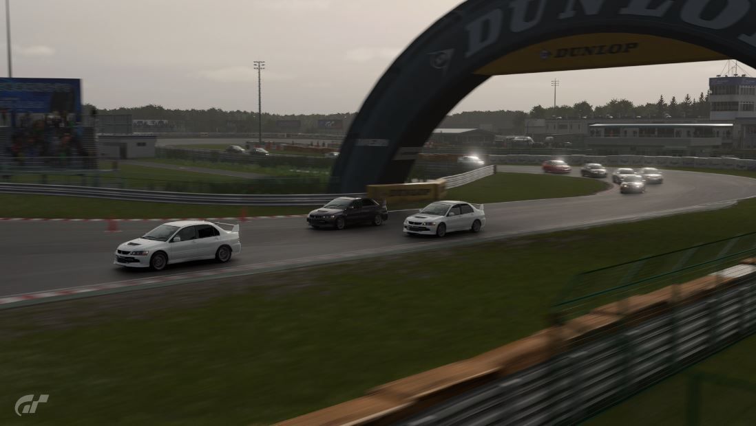 Gran Turismo 7 - Mitsubishi Lancer Evolution IX's racing at Tsukuba