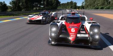 Two cars racing at Le Mans in Gran Turismo 7