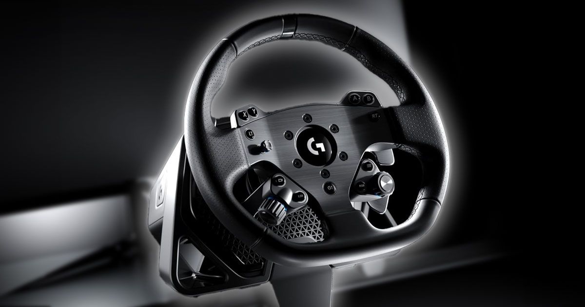 An all-black Logitech racing wheel with a white glow around it.