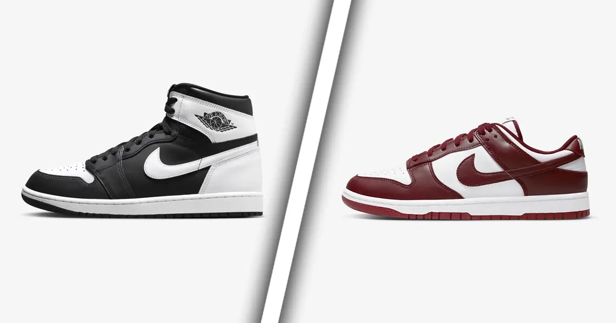 A black and white Jordan 1 High on one side of a white line. On the other, a dark red and white Nike Dunk Low.