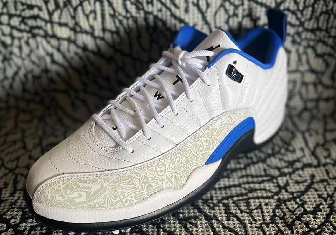 Air Jordan 12 Low Golf NRG "Laser" product image of a white and blue sneaker with grey laser overlays.