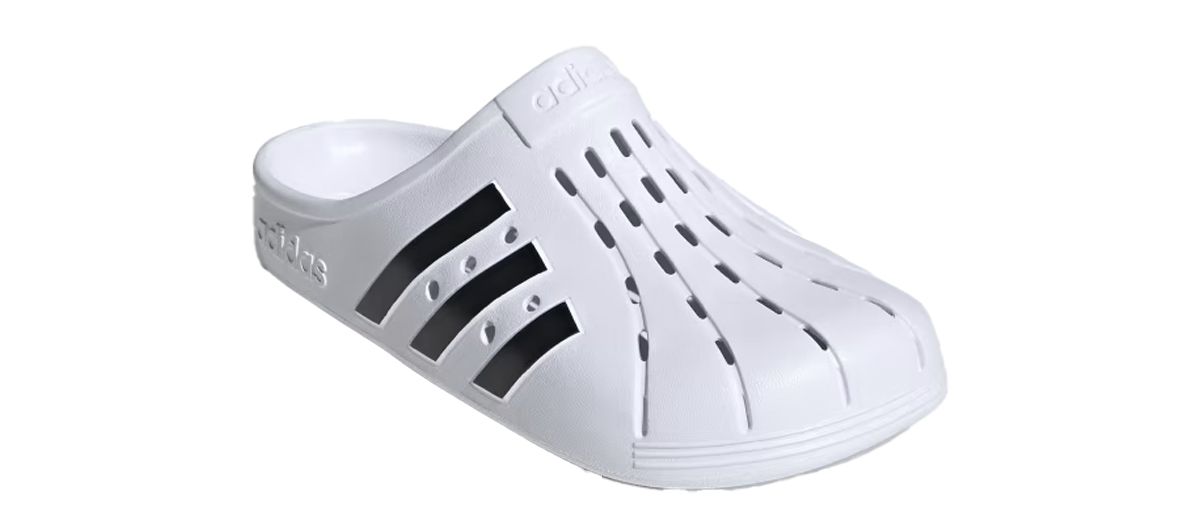 adidas Adilette Clogs product image of a white slip-on shoe with three black stripes down the side.