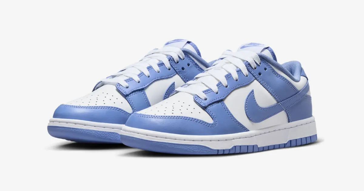 A pair of white and light blue Nike Dunk Lows.