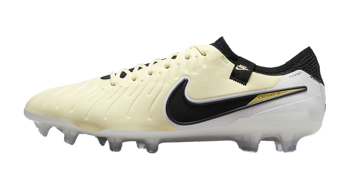 Nike Tiempo Legend 10 Elite product image of a white and light yellow football boot with a black Swoosh down the sidewall.