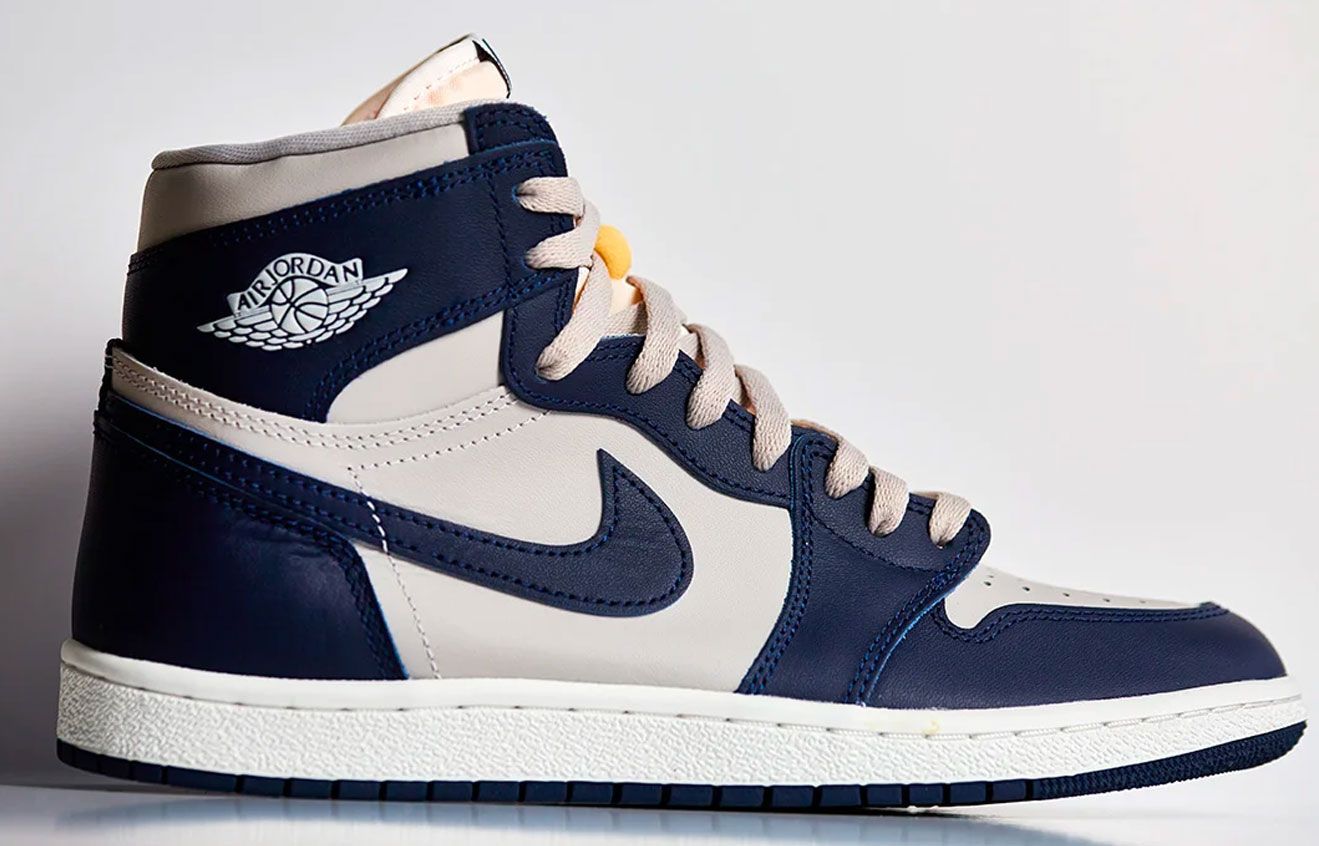 Air Jordan 1 "Georgetown" product image of a white and navy blue sneaker.