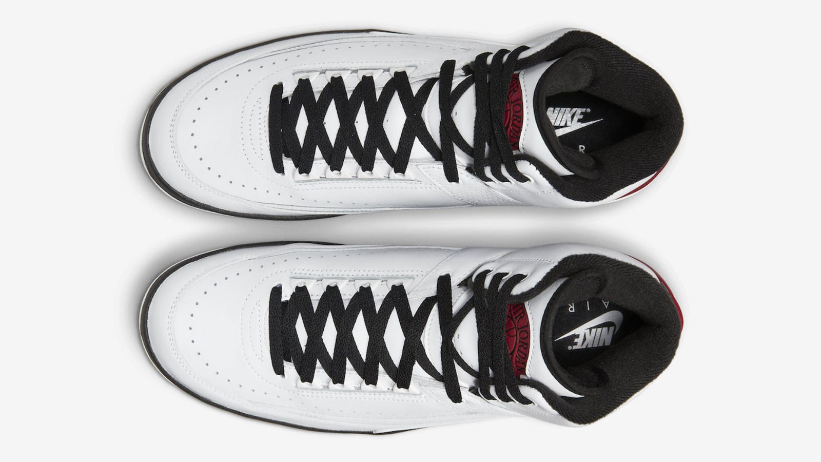 Air Jordan 2 "Chicago" product image of a pair of white, red, and black leather sneakers. 