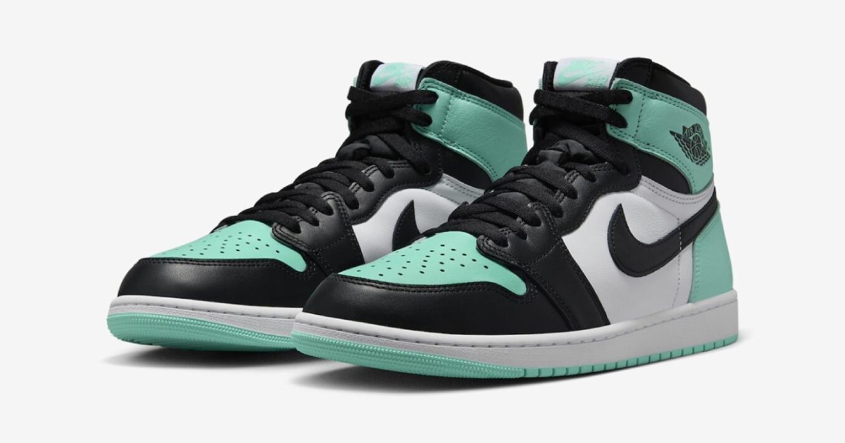 A pair of black, white, and mint green Air Jordan 1 High sneakers .