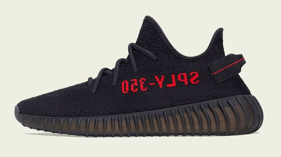 adidas Yeezy Boost 350 v2 "Black Red" product image of an all-yellow sneaker.