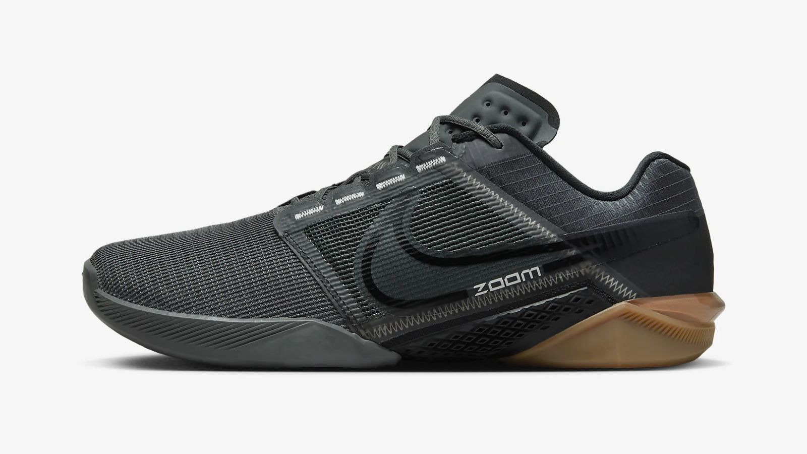 Nike Zoom Metcon Turbo 2 product image of a dark grey and black trainer with a brown heel.