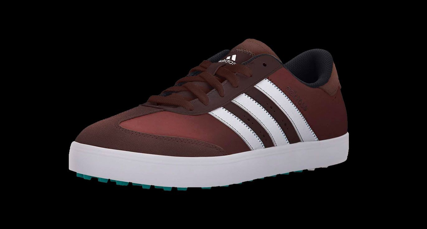 adidas product image of a single brown and white shoe with a green sole.