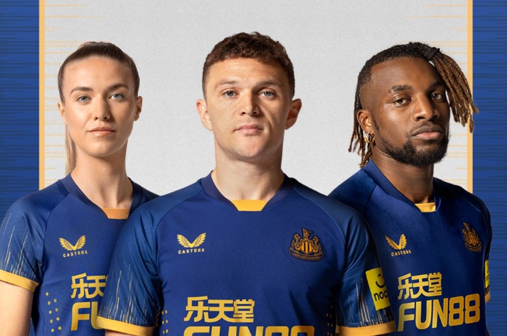 Newcastle United away kit 2022/23 product image of a navy blue shirt with gold details.