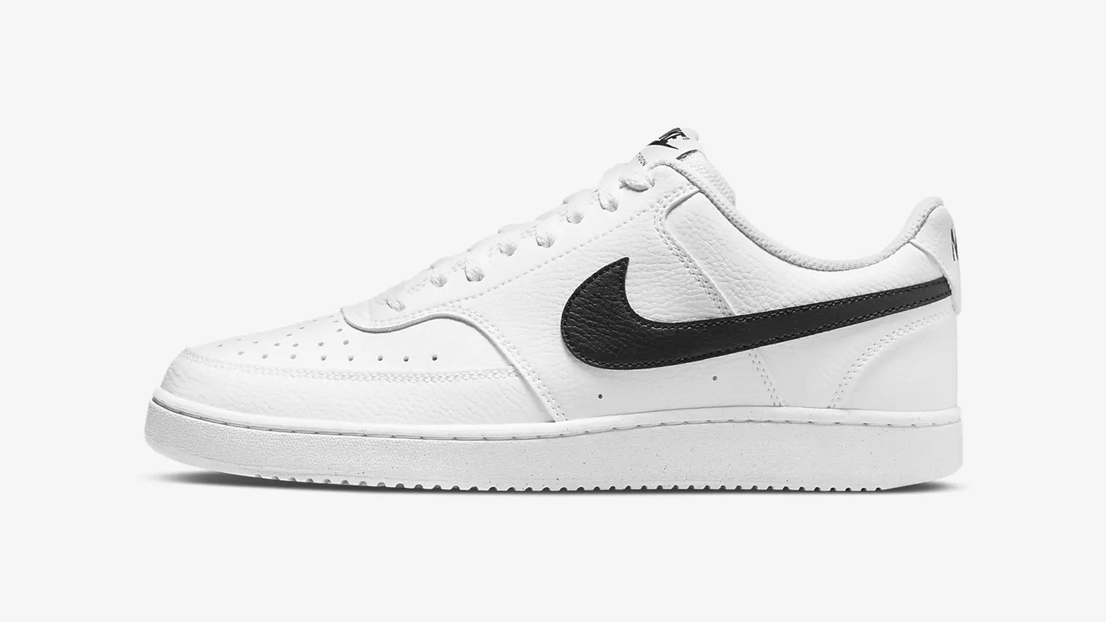 Nike Court Vision Next Nature Low "White Black" product image of a white leather sneaker with black Swooshes.