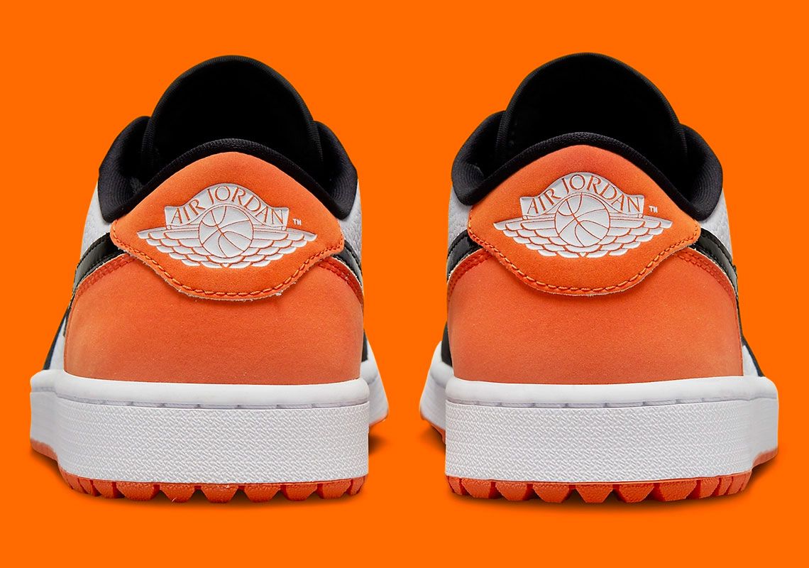 Air Jordan 1 Low Golf Shattered Backboard product image of a pair of white, orange, and black golf sneakers.