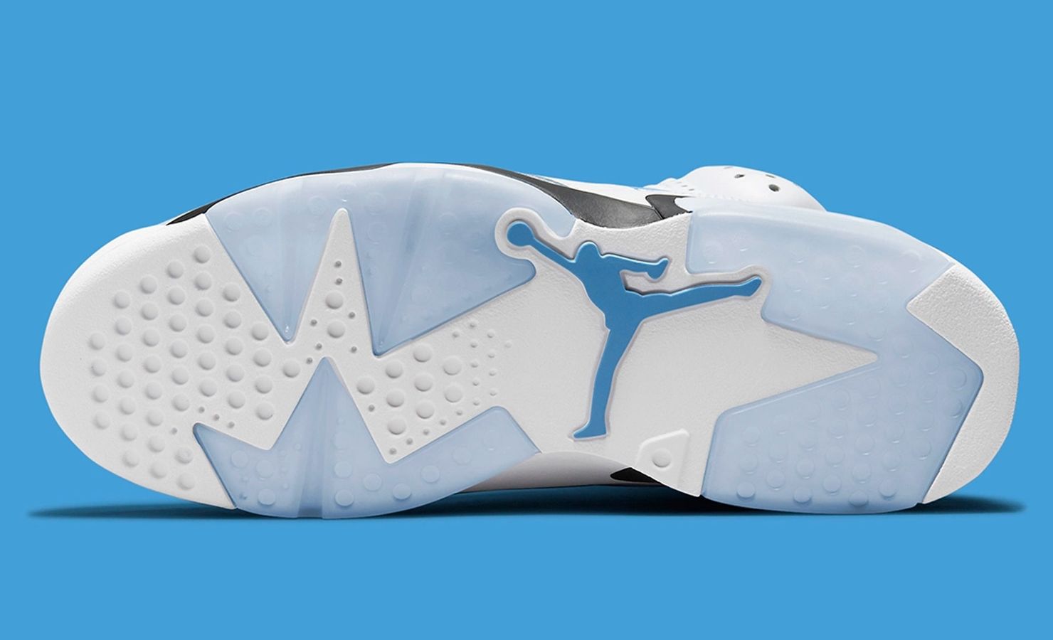 Air Jordan 6 "UNC" product image of a white sneaker with light blue and black details.