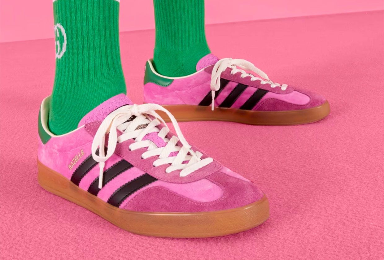 Gucci x adidas Gazelle product image of a pink suede sneaker with black, green, and white details, plus a gum sole.