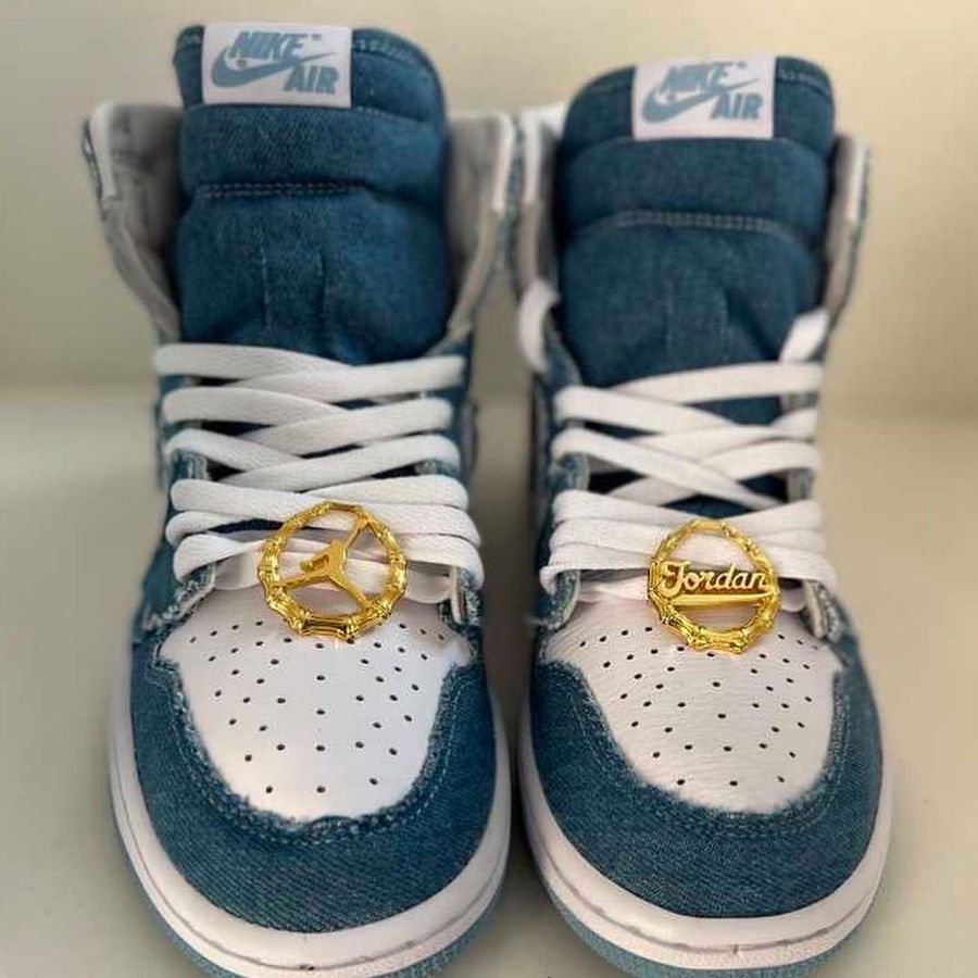 Air Jordan 1 "Denim" leaked image of a white pair of sneakers covered in denim overlays.