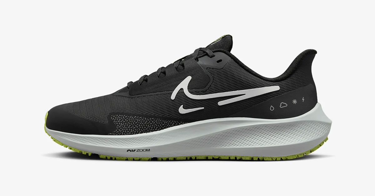 Nike Pegasus 39 Shield product image of a black running shoe with white branding on the side and midsole.