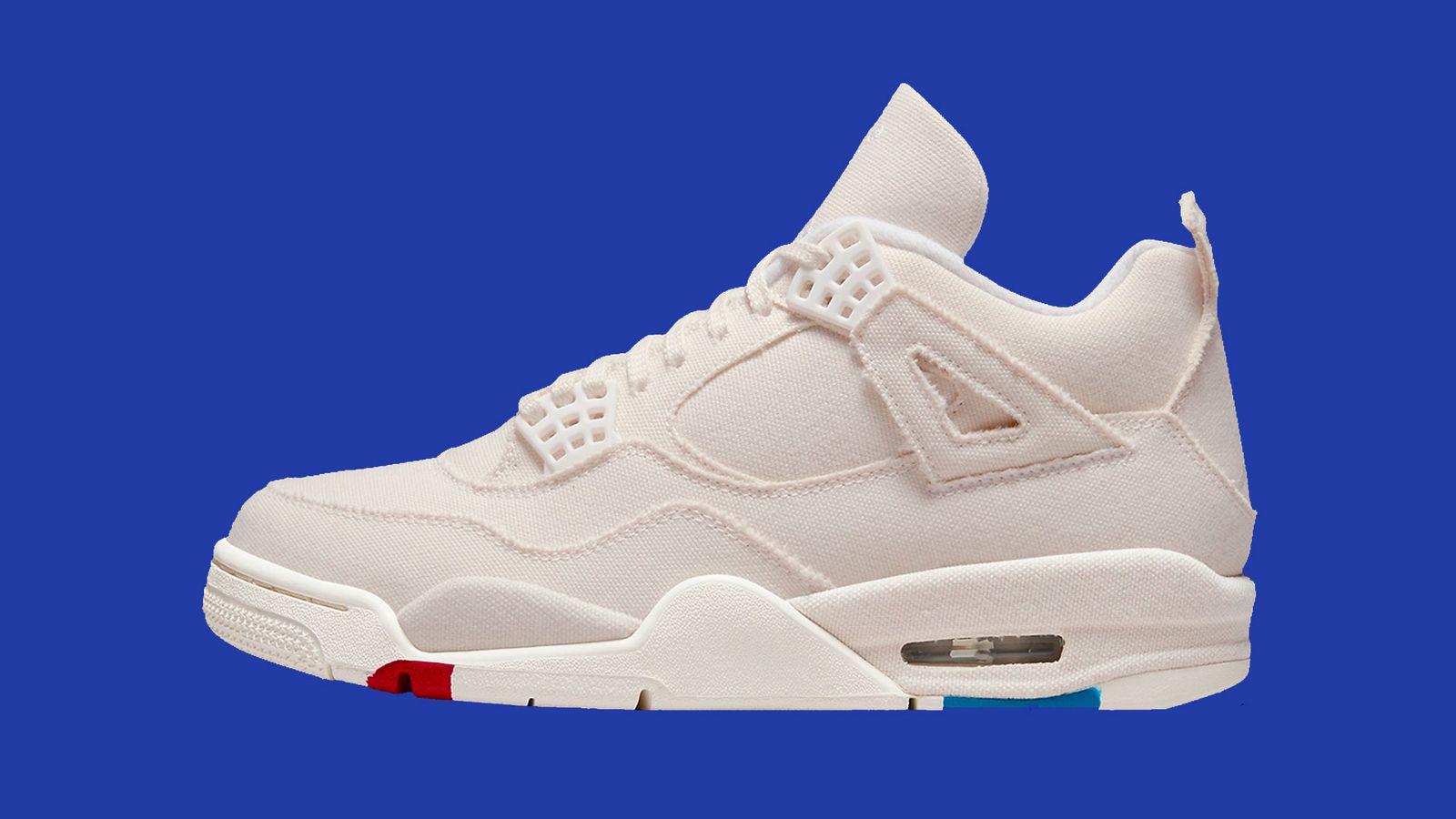 Air Jordan 4 "Blank Canvas" product image of an all-sail pair of sneakers with red and blue details.