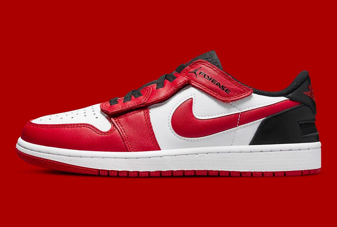 Air Jordan 1 Low Flyease product image of a white sneaker with black and red overlays.