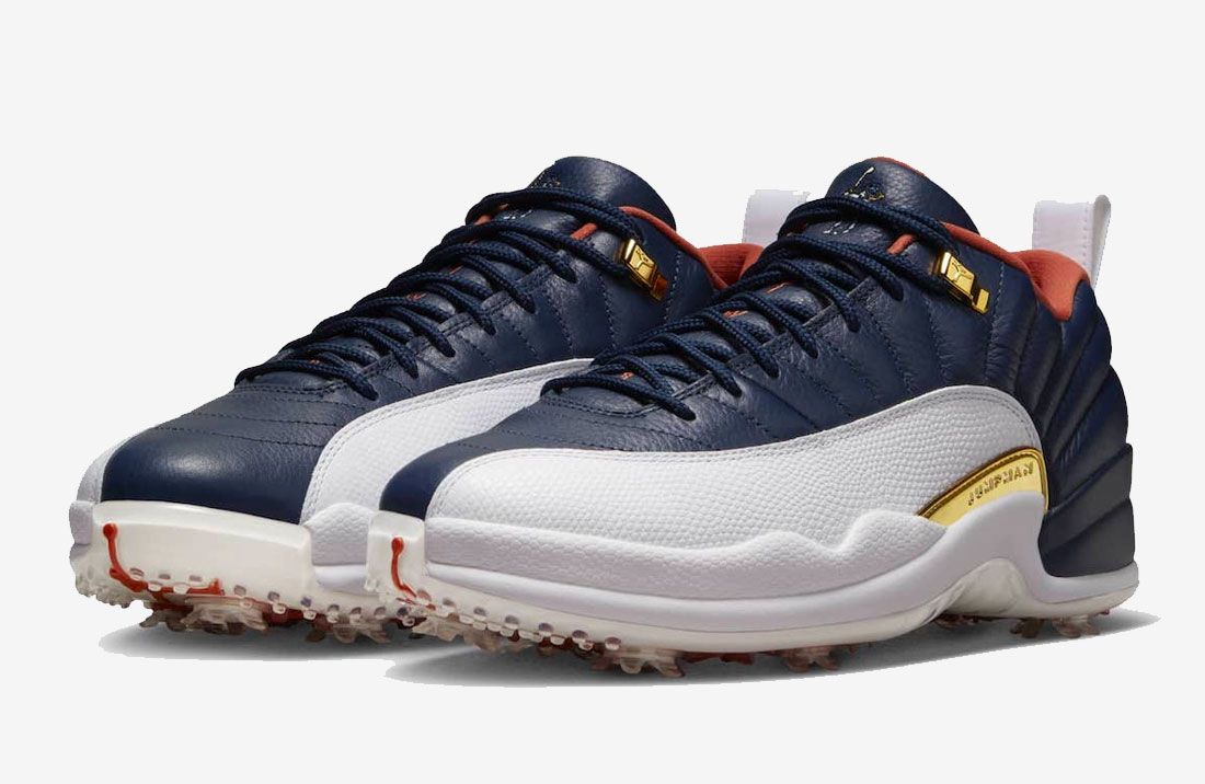 Eastside Golf x Air Jordan 12 Low product image of a navy and white sneaker with metallic gold accents.