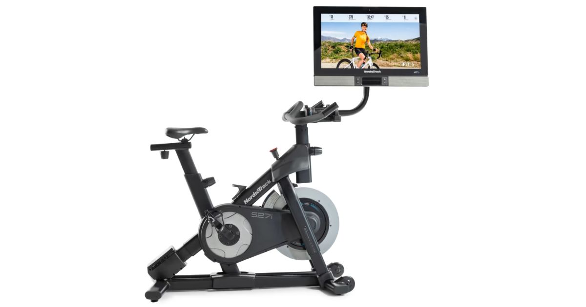 NordicTrack Commercial S27i product image of a dark grey framed bike with large HD touchscreen display.