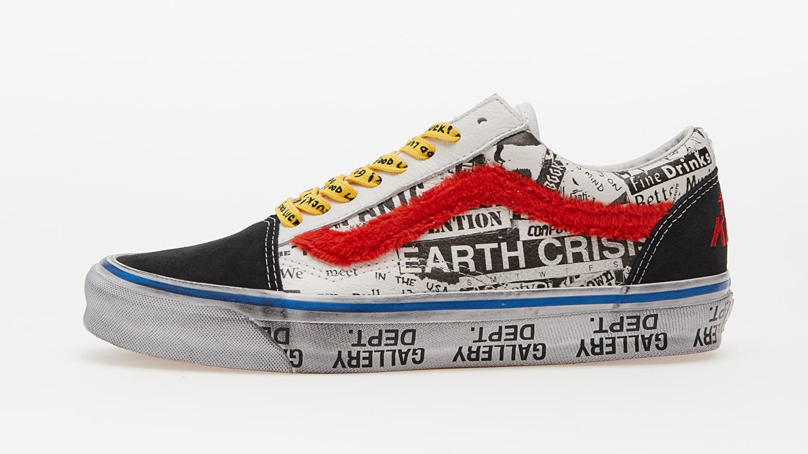 Gallery Dept. x Vans Old Skool "Good Luck" product image of a distressed black and white Vans shoe featuring headline cutout print, yellow laces, fluffy red side stripe, and blue details.