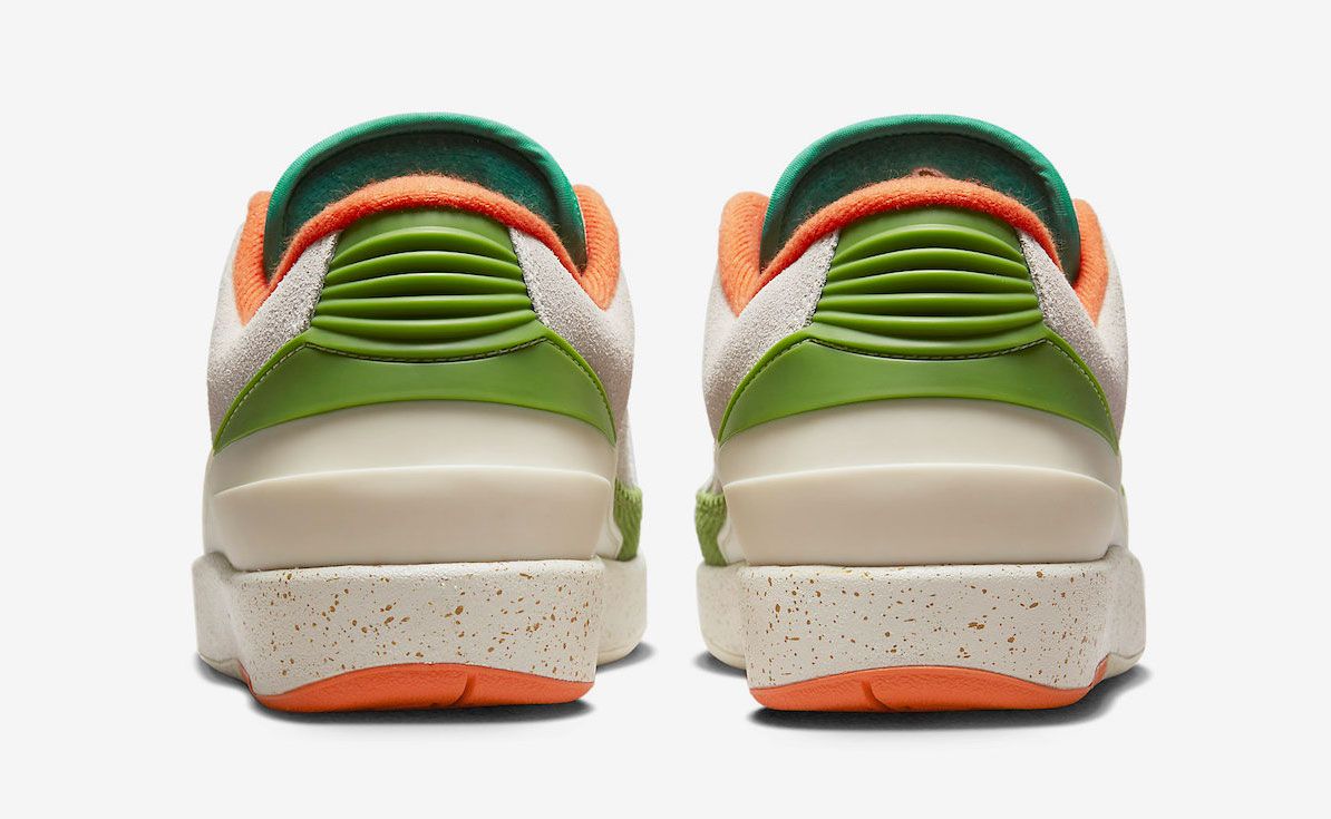 TITAN x Air Jordan 2 Low product image of a Sail and Coconut Milk leather sneaker with orange, green, and teal details.