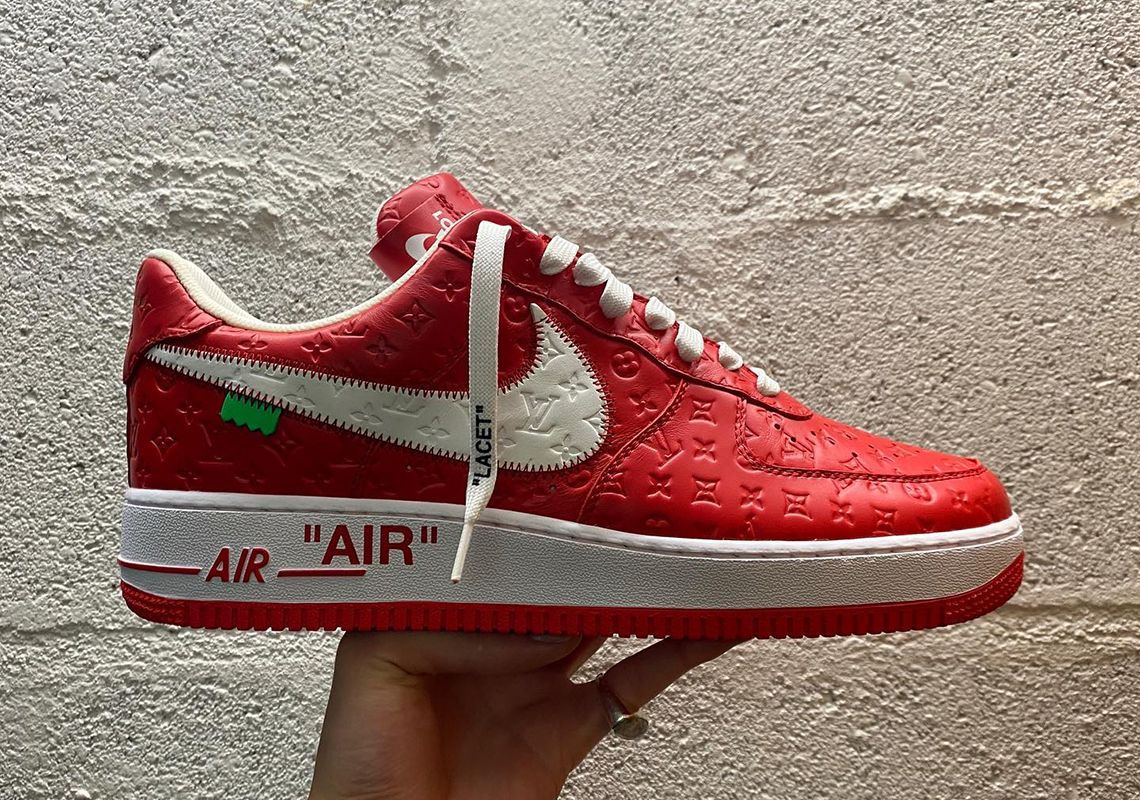 Louis Vuitton x Off-White x Nike Air Force 1 product image of a red and white LV debossed sneaker.