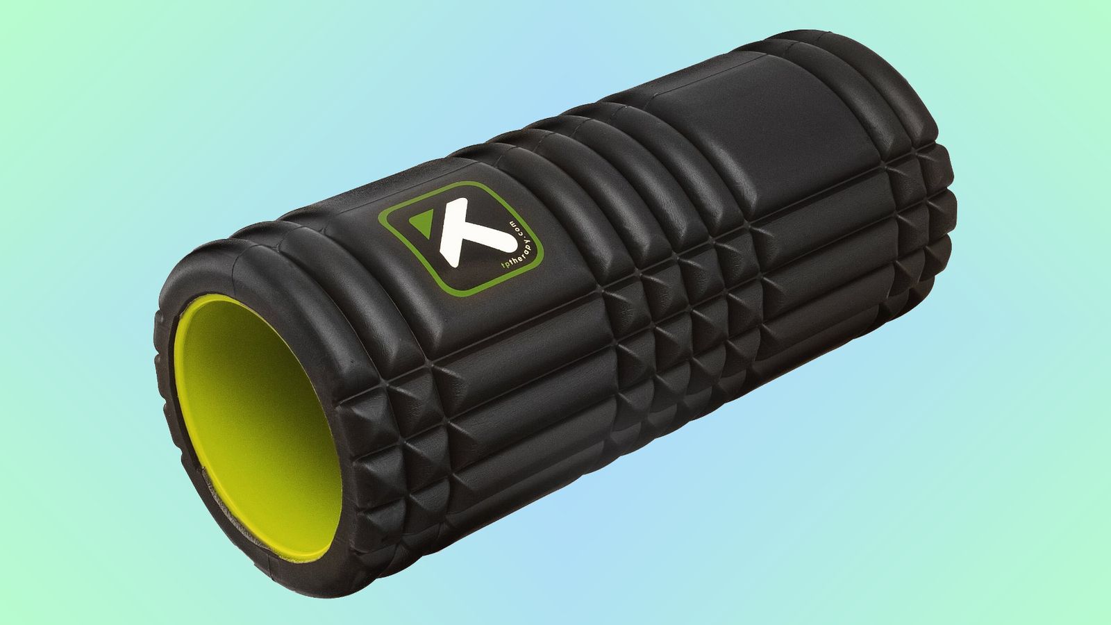 TriggerPoint GRID Foam Roller product image of a black roller with a green interior.