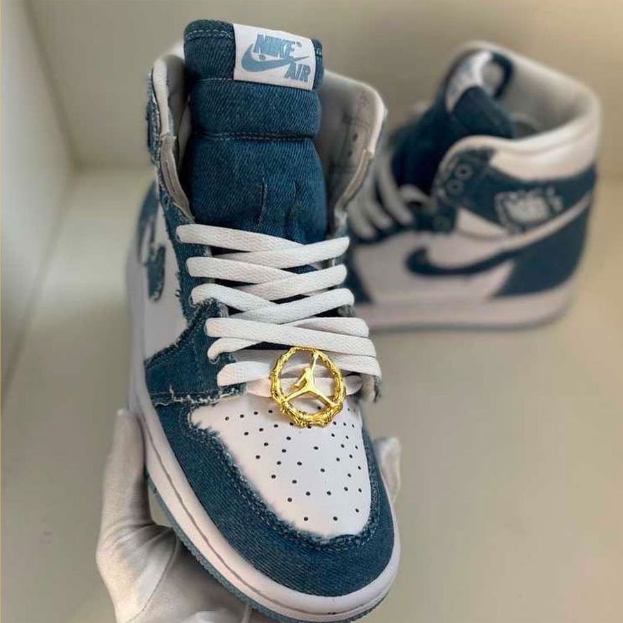 Air Jordan 1 "Denim" leaked image of a white pair of sneakers covered in denim overlays.