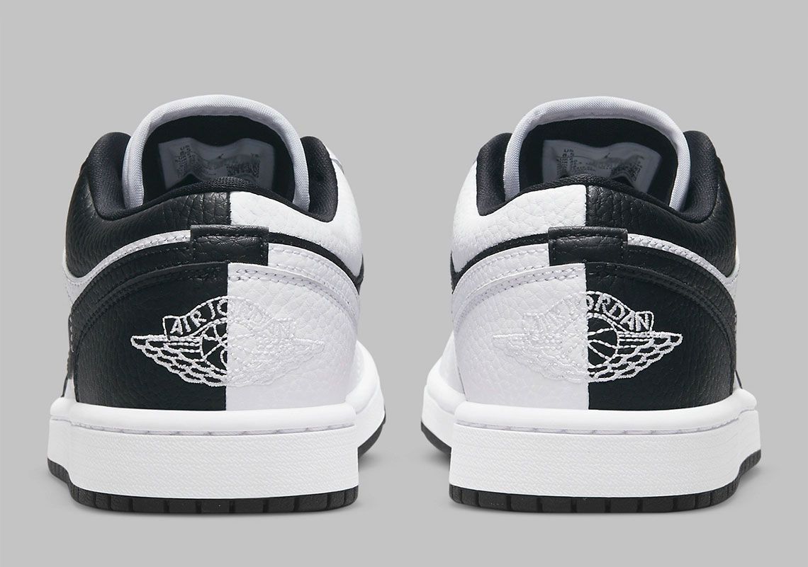 Air Jordan 1 Low "Homage" product image of a black and white sneaker split and inverted down the middle.