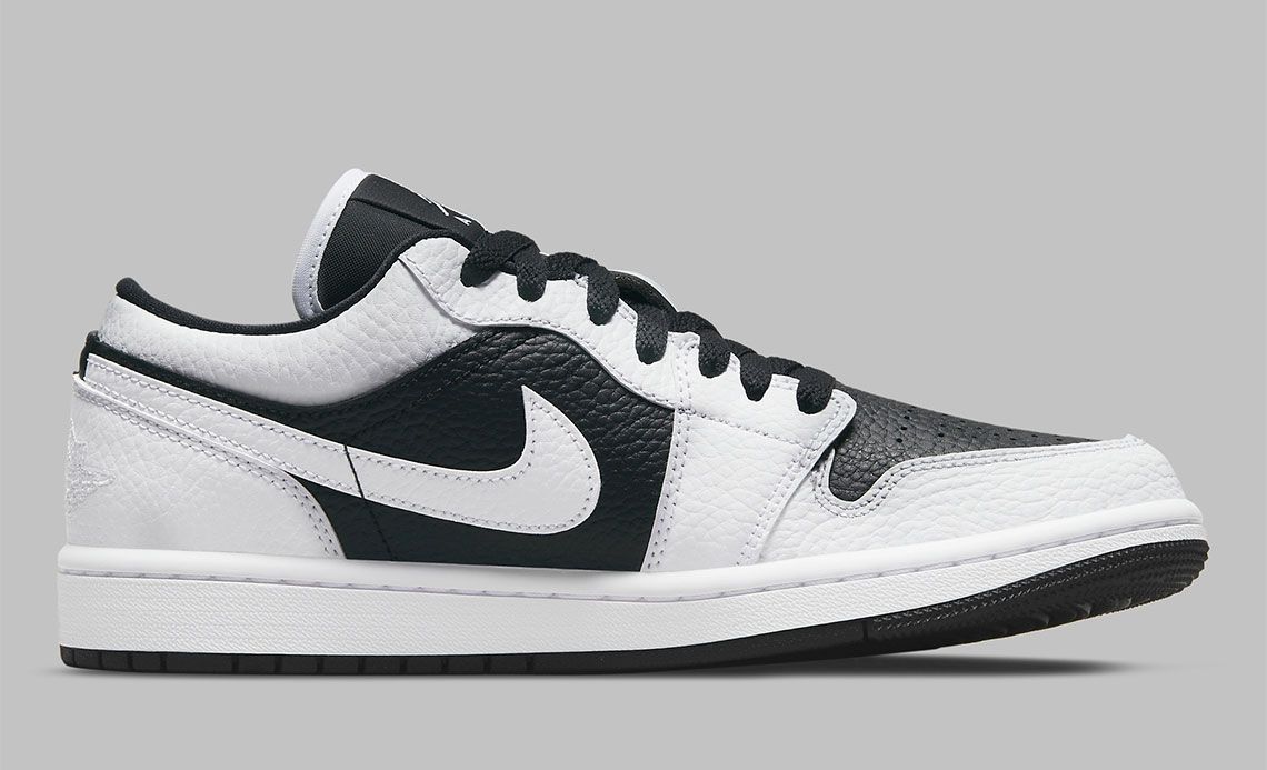 Air Jordan 1 Low "Homage" product image of a black and white sneaker split and inverted down the middle.