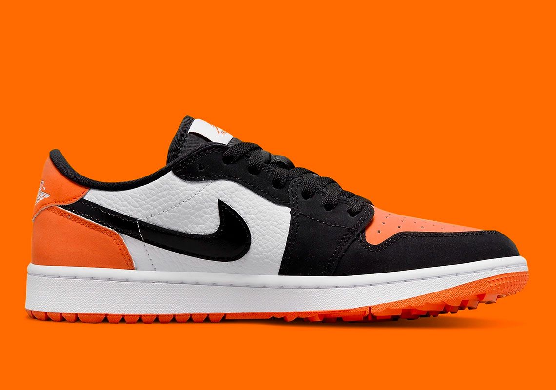 Air Jordan 1 Low Golf Shattered Backboard product image of a pair of white, orange, and black golf sneakers.