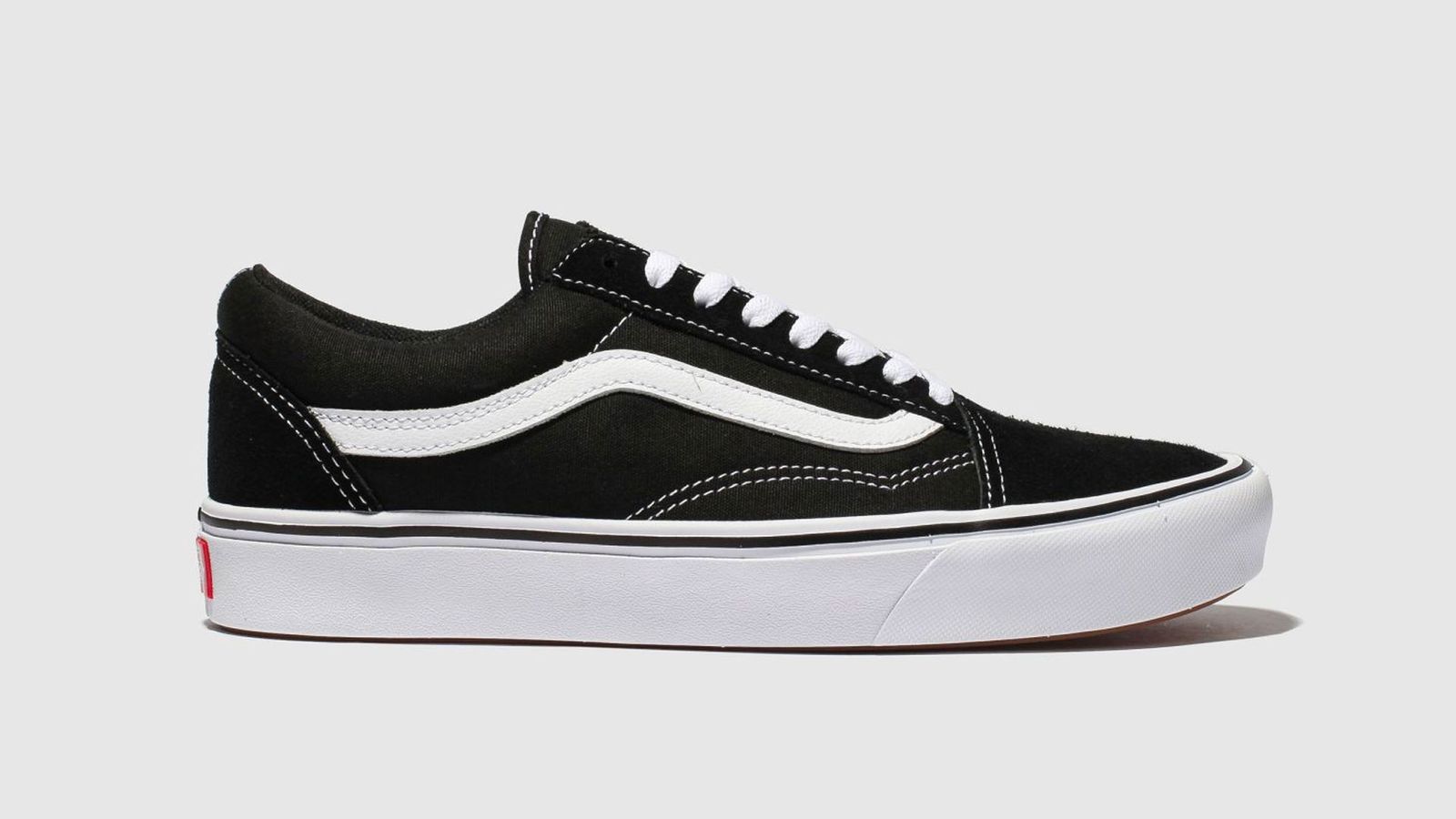 Vans Old Skool Black White product image of a black and white low-top sneaker.