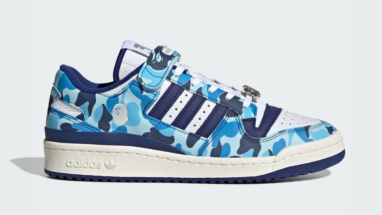 BAPE x adidas Forum 84 Low "30th Anniversary Blue" product image of a camoflagued low-top in multiple shades of blue, featuring a strap across the tongue.