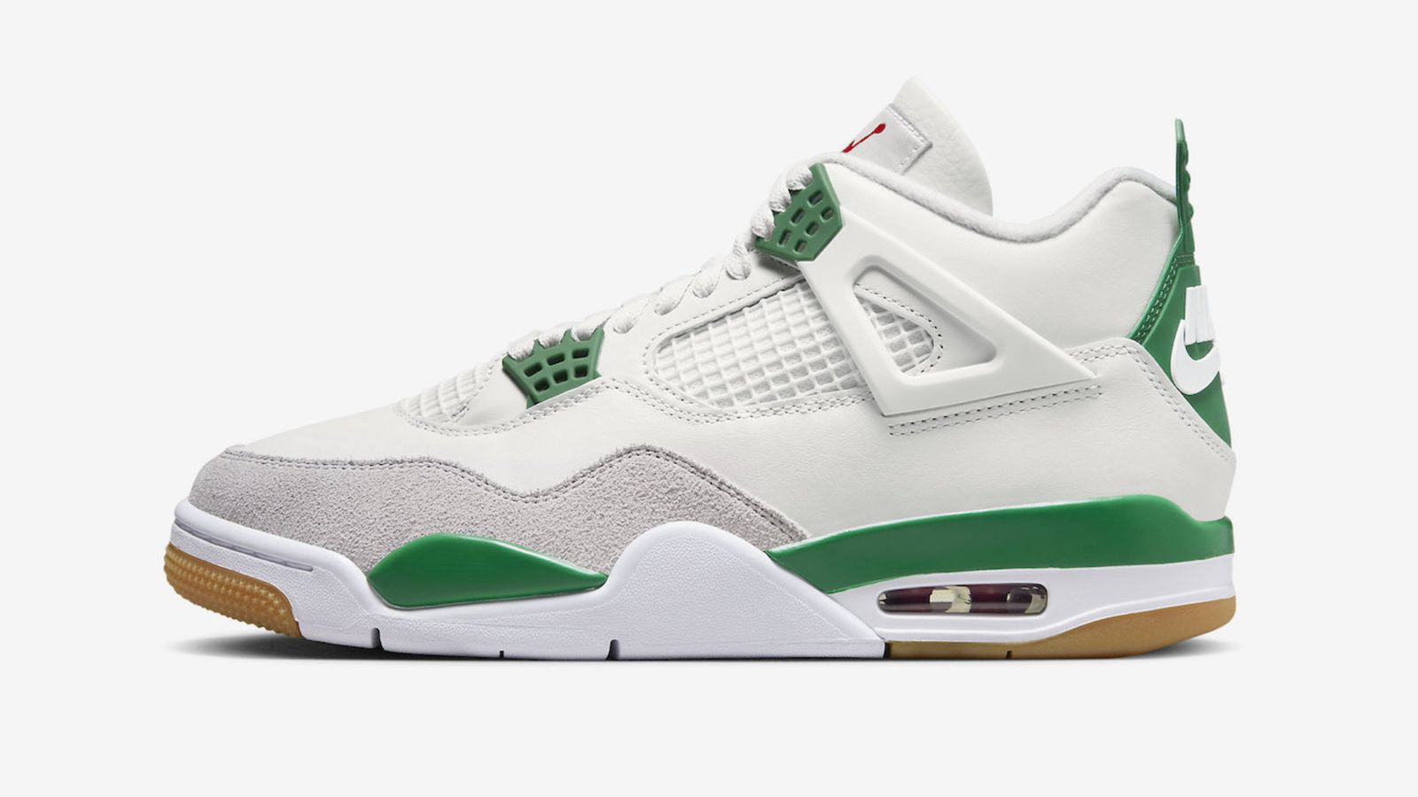 Nike SB x Air Jordan 4 "Pine Green" product image of a white leather and grey suede sneaker with green accents.