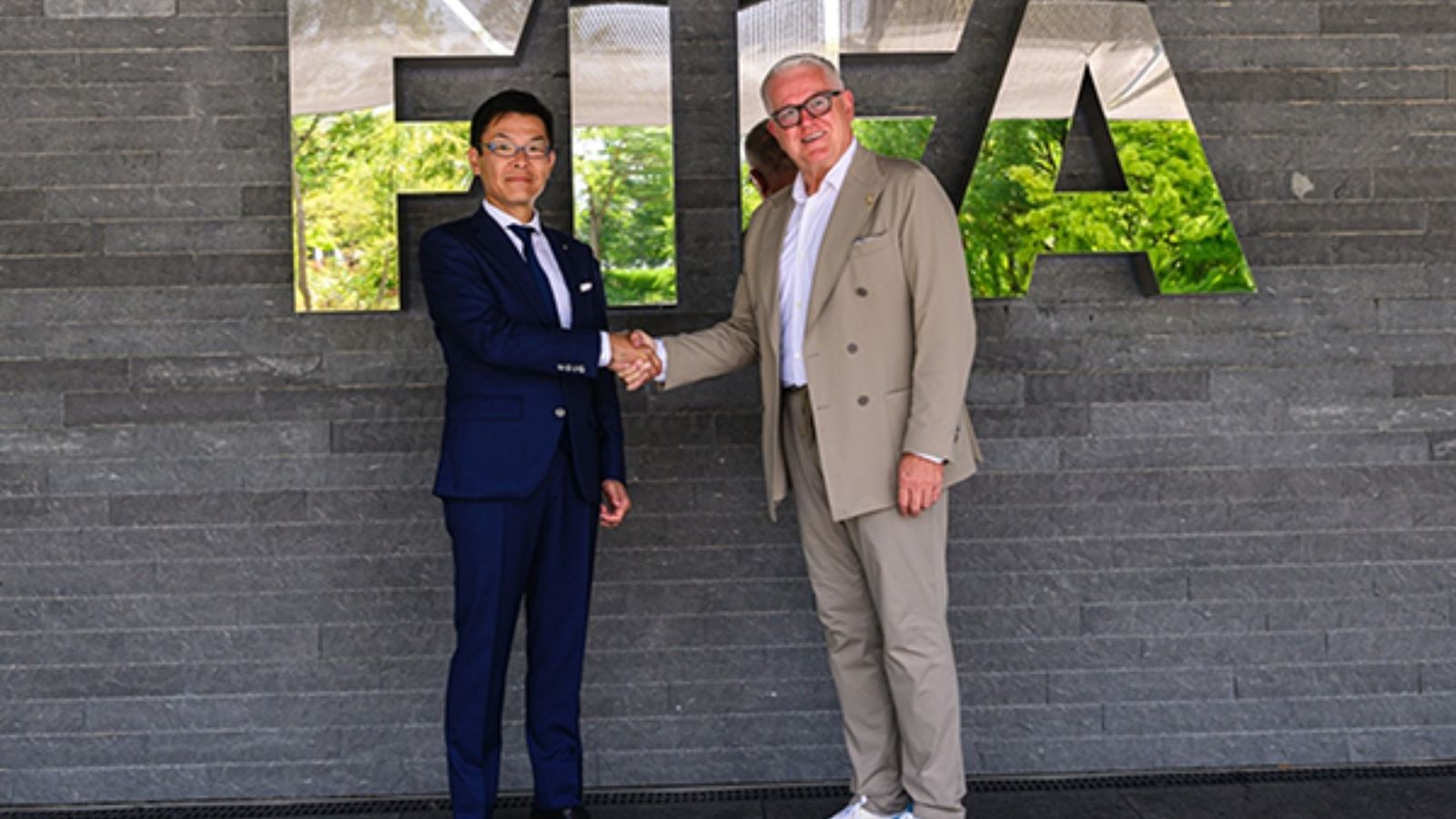 Konami Senior Executive Officer Koji Kobayashi and Romy Gai, Chief Business Officer at FIFA