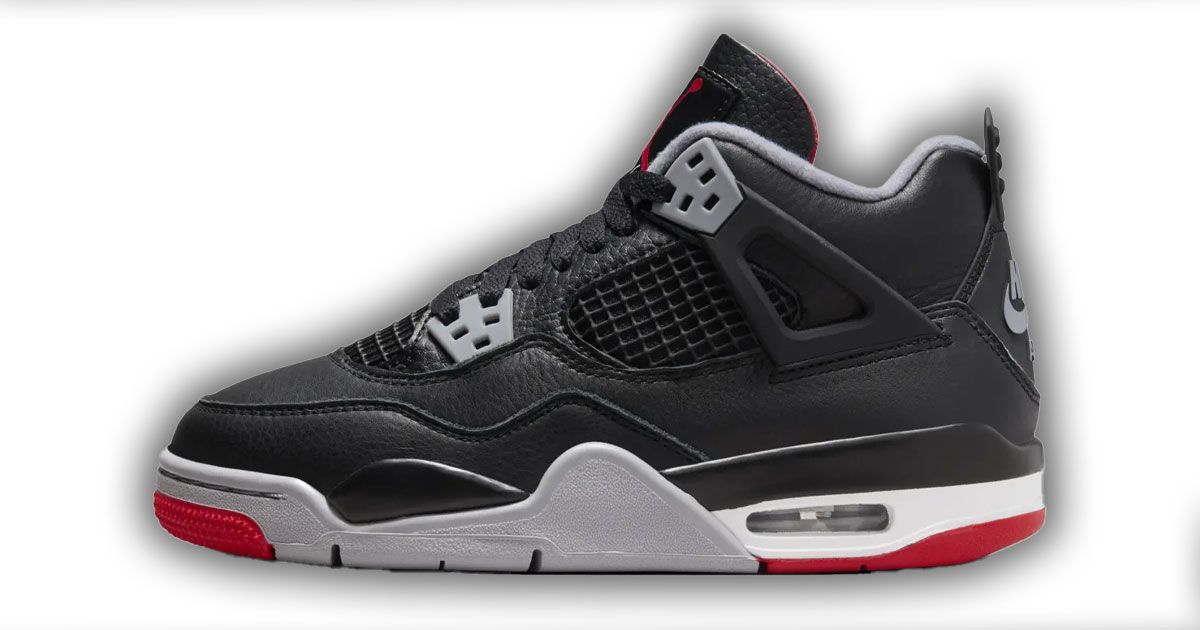 Air Jordan 4 "Bred Reimagined" product image of a black leather sneaker featuring a grey, white, and red sole unit featuring Air bubbles in the heel.