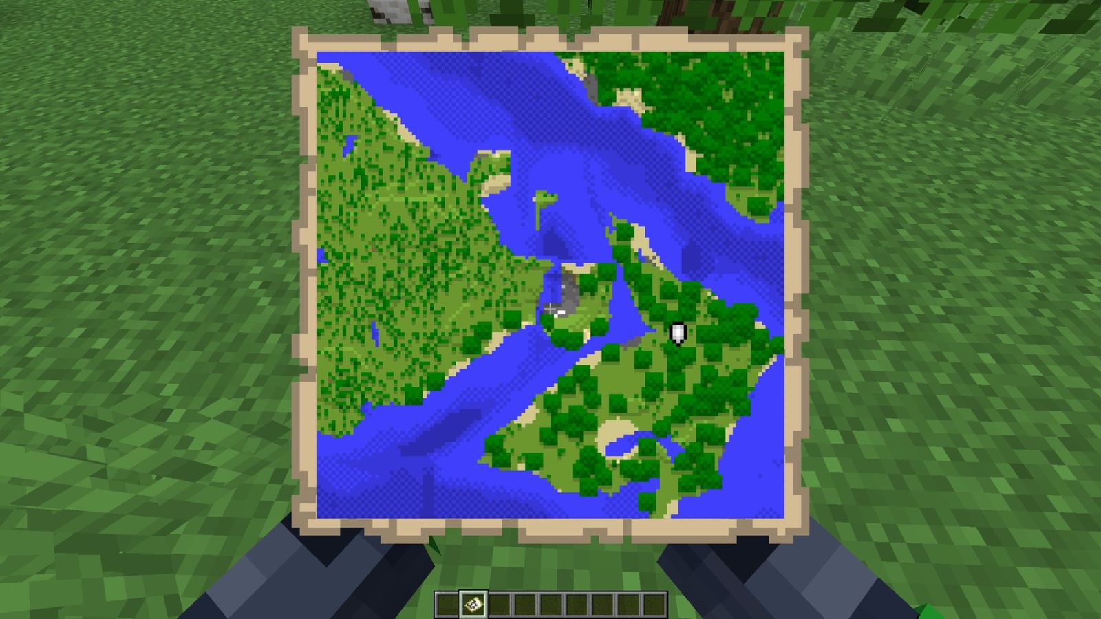 A screenshot of a player holding a Minecraft map. 