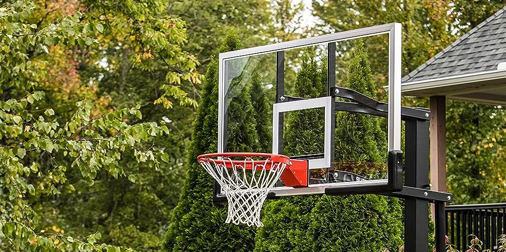 Silverback SB60 product image of a red and white basketball hoop with a clear backboard.