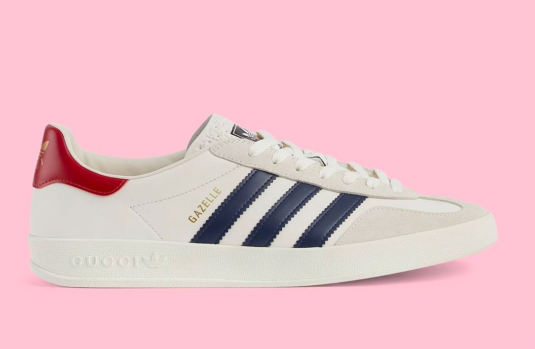 Gucci x adidas Gazelle product image of a white sneaker with navy and red details.